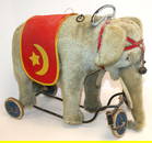 Vintage ca 1940/50 Steiff mohair elephant on wheels - 16" tall x 22" long