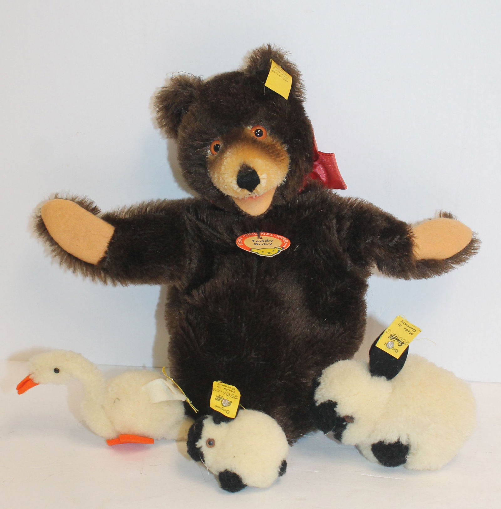 Lot of 4 Steiff stuffed toys incl bear puppet "Teddy Baby" & 3 pom poms - 2 bunnies & a swan - all w (1 of 9)