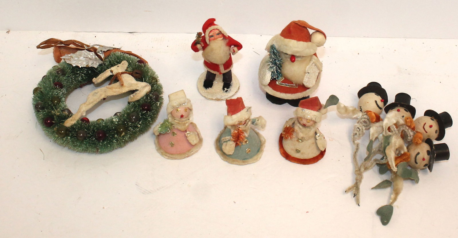 Christmas tin filled snowmen, Santas, & bottle brush wreath w reindeer: Christmas tin filled snowmen, Santas, & bottle brush wreath w reindeer
