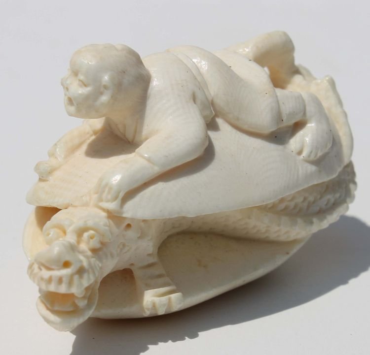 Japanese carved ivory netsuke clamshell w dragon & : Japanese carved ivory netsuke clamshell w dragon & boy - 2 1/4" long