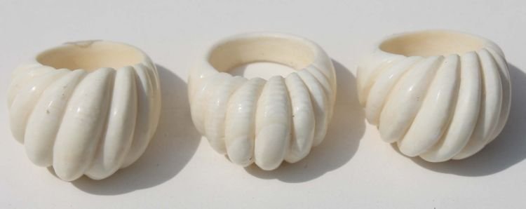 3 Chinese carved ivory rings: 3 Chinese carved ivory rings