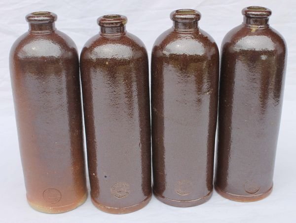 set of 4 antique stoneware brown salt glaze ink bot: set of 4 antique stoneware brown salt glaze ink bottles marked France - 7" tall