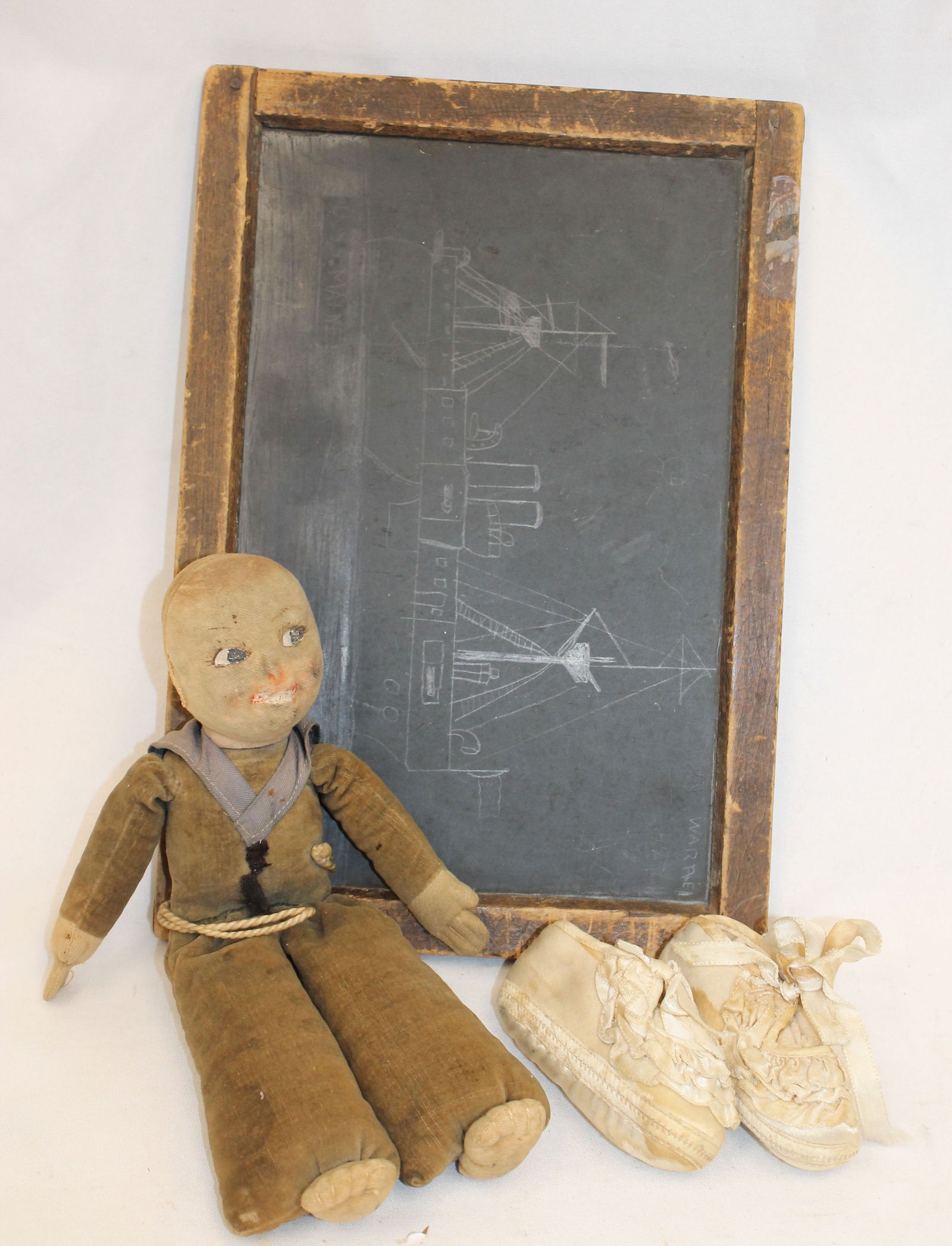 Child related lot incl slate/chalk board; satin baby shoes & early theorem sailor doll (1 of 8)