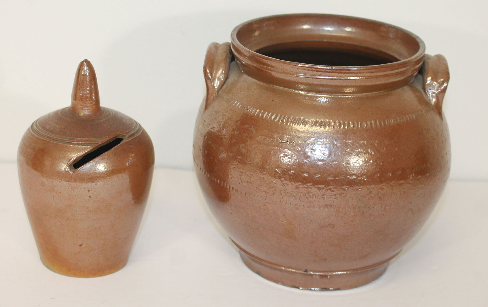 Lot of 2 pieces of antique stoneware incl small tool dec jar & a bank - 6 3/4" tall jar & 6" tall (1 of 10)