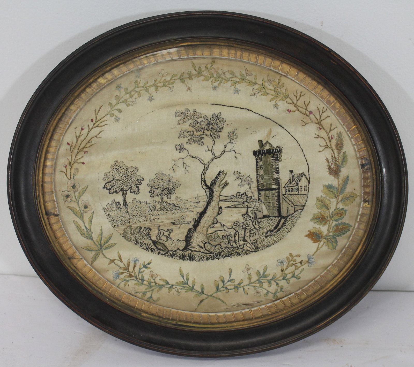 Needlepoint on silk landscape w figure in boat & dog on shore surrounded by floral wreath - 10" x 11: Needlepoint on silk landscape w figure in boat & dog on shore surrounded by floral wreath - 10" x 11 1/4"