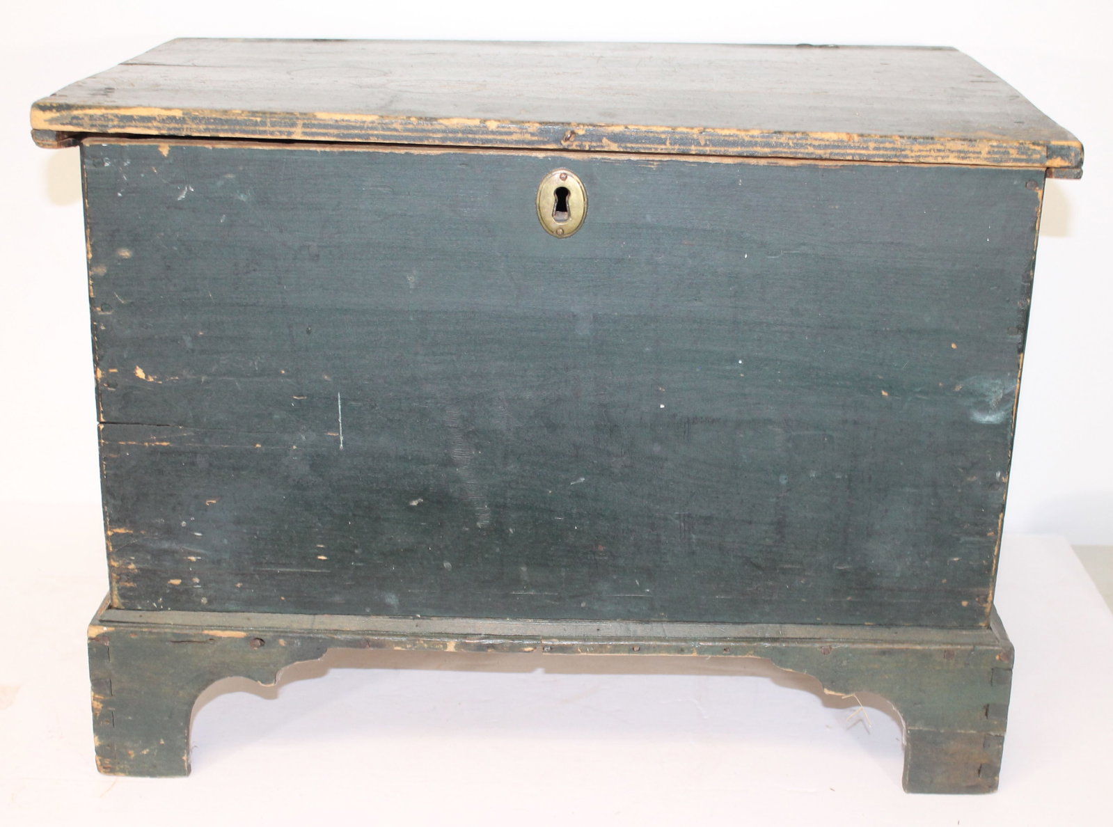 Antique diminutive collectibles box on bracket feet in green paint - 15" tall x 21 1/4" wide x 14": Antique diminutive collectibles box on bracket feet in green paint - 15" tall x 21 1/4" wide x 14" deep