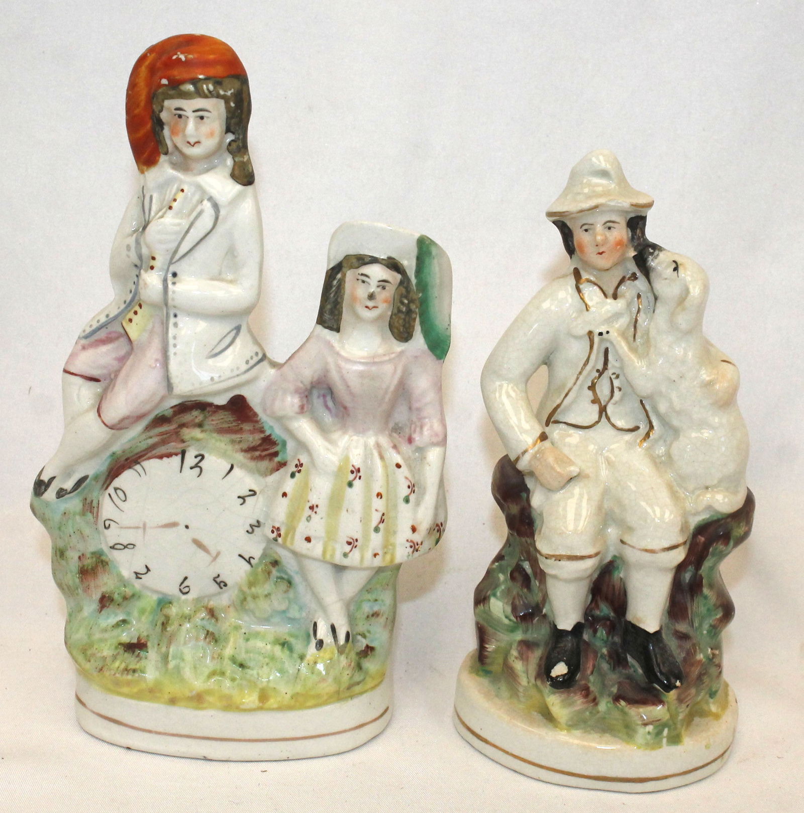Lot of 2 Antique Staffordshire figurines incl man holding dog & flat back Scottish mantle clock (1 of 7)