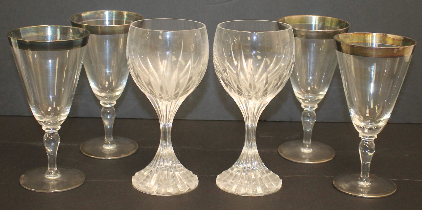 Pair of Baccarat crystal wine glasses together w a set of 4 silver rimmed wine glasses: Pair of Baccarat crystal wine glasses together w a set of 4 silver rimmed wine glasses