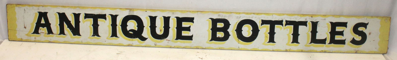 Wooden painted sign "Antique Bottles" - one sided - approx 8' long x 9 1/2" (1 of 4)