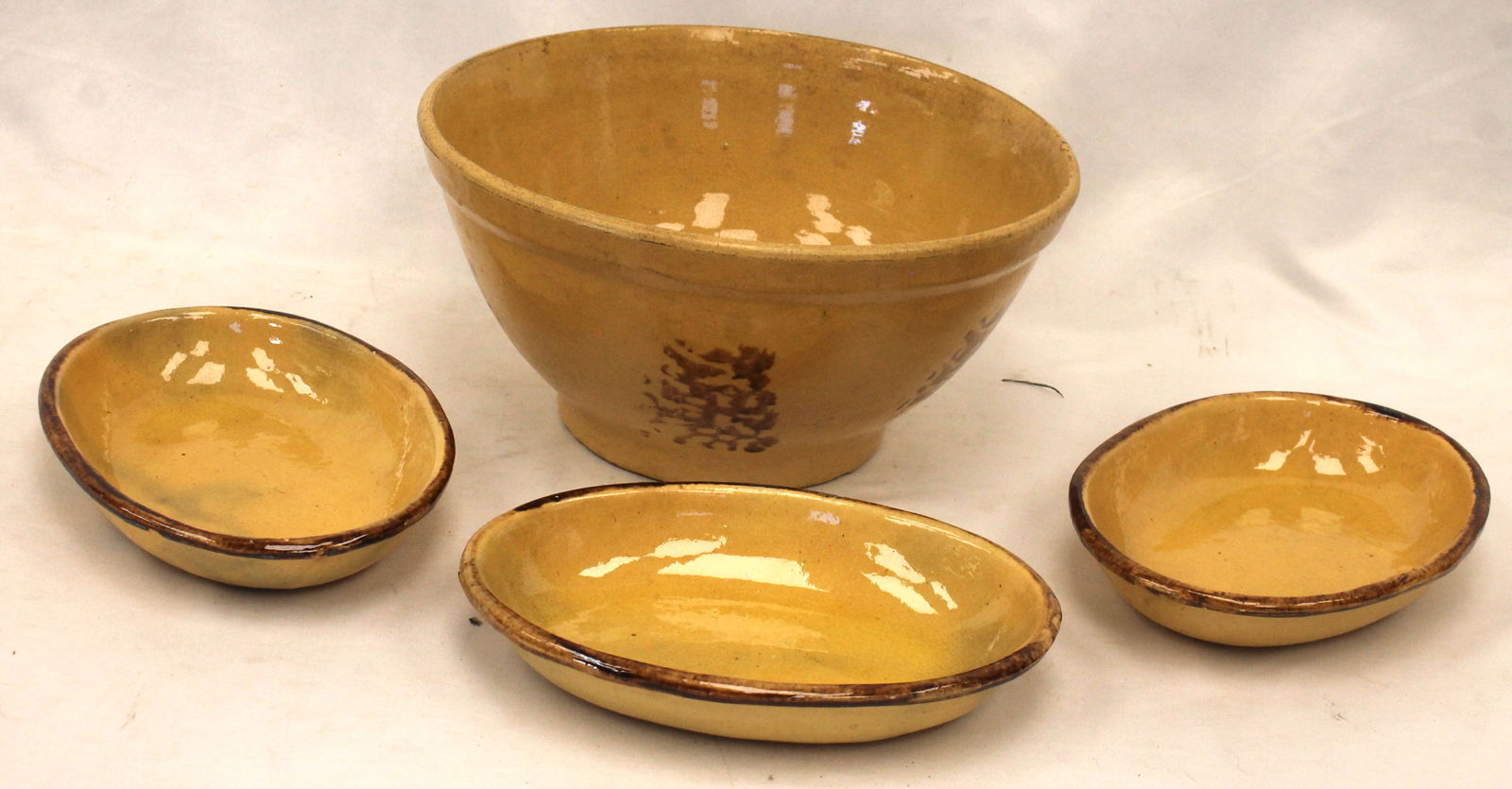 Lot of 4 pcs antique yellowware incl large 11" diam bowl w brown sponge dec & 3 9" oval dishes w (1 of 6)
