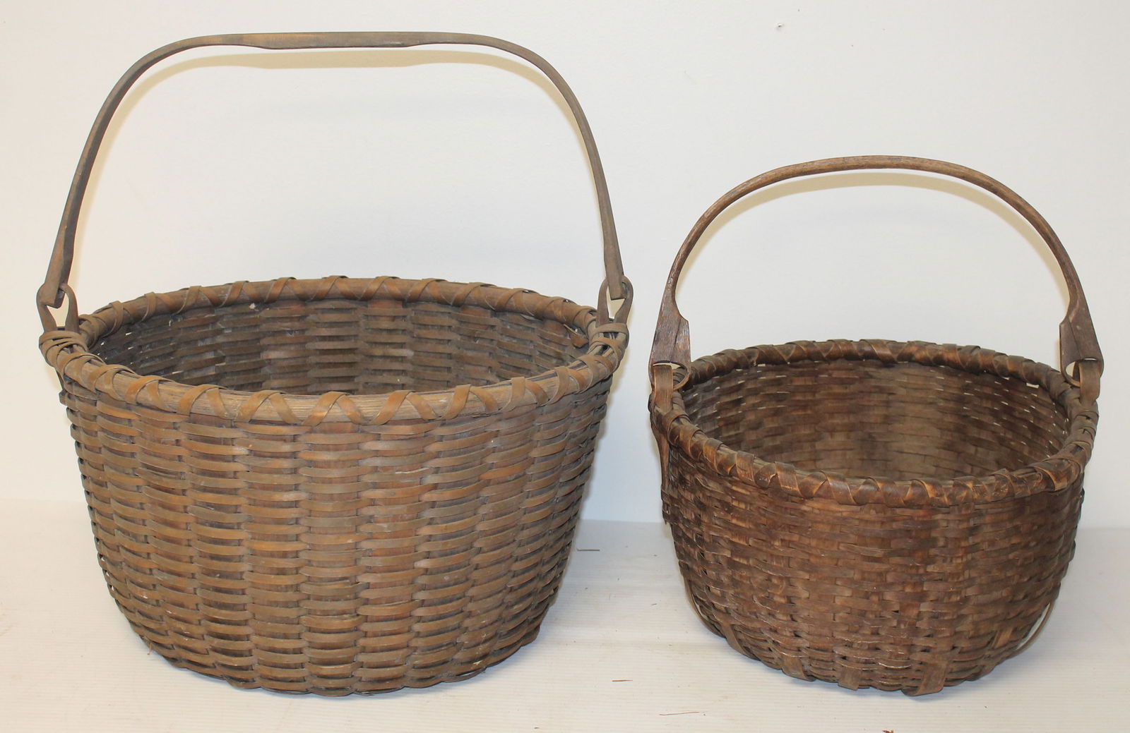 Lot of 2 bail handled gathering baskets incl 1 Taghanik 7"x12" diam & 8 1/2" tall x 15" diam (1 of 10)