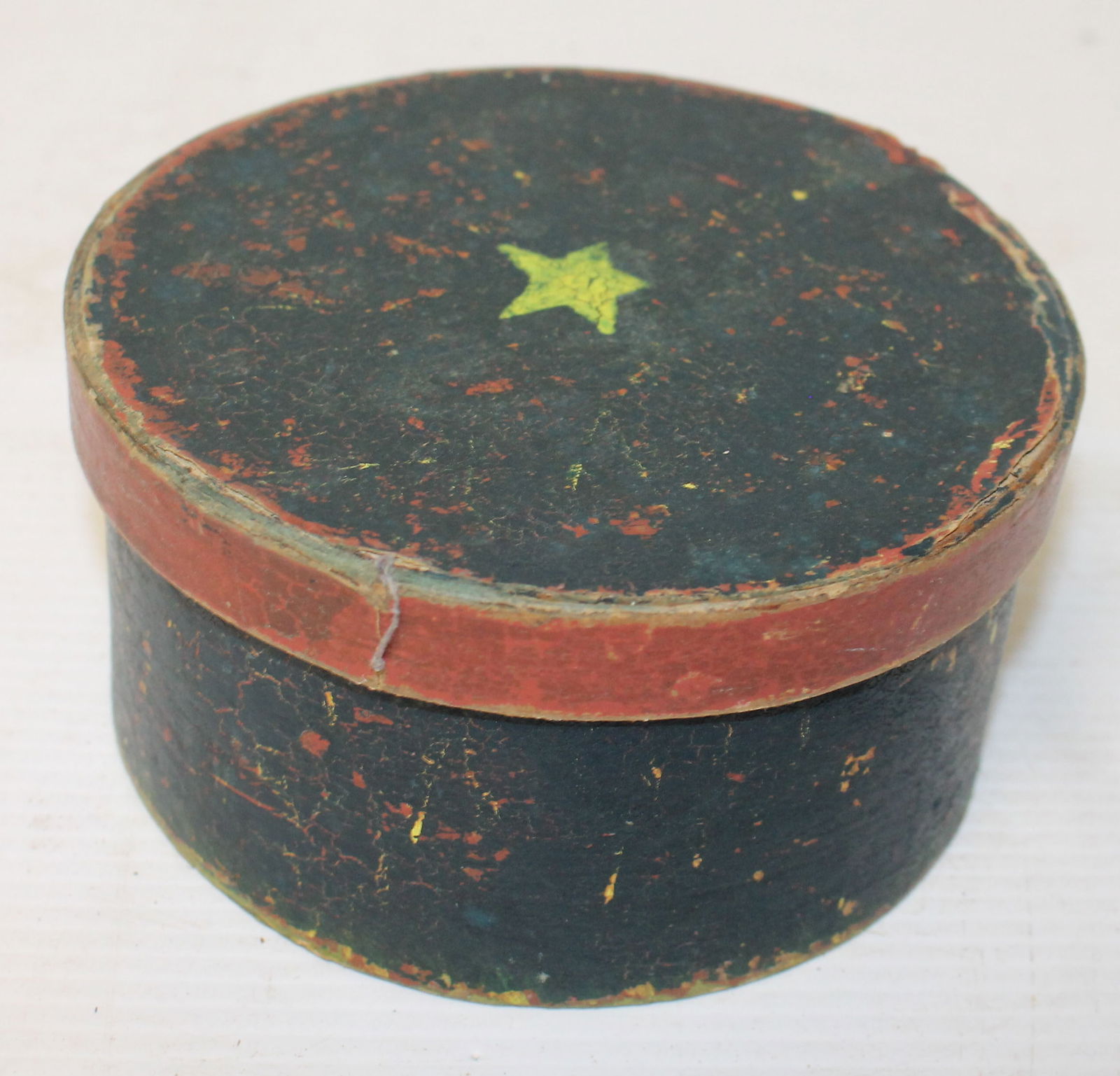 Antique cardboard round pantry box in blue & red paint w yellow star on lid - 6" diam x 3" tall (1 of 3)