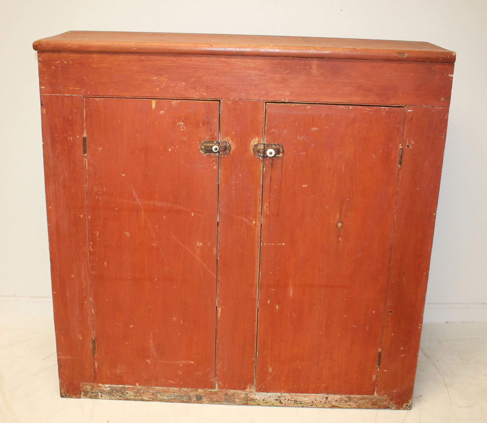 Antique 2 door cupboard in red paint - 40 3/4" tall x 41" wide x 13 3/4" deep: Antique 2 door cupboard in red paint - 40 3/4" tall x 41" wide x 13 3/4" deep