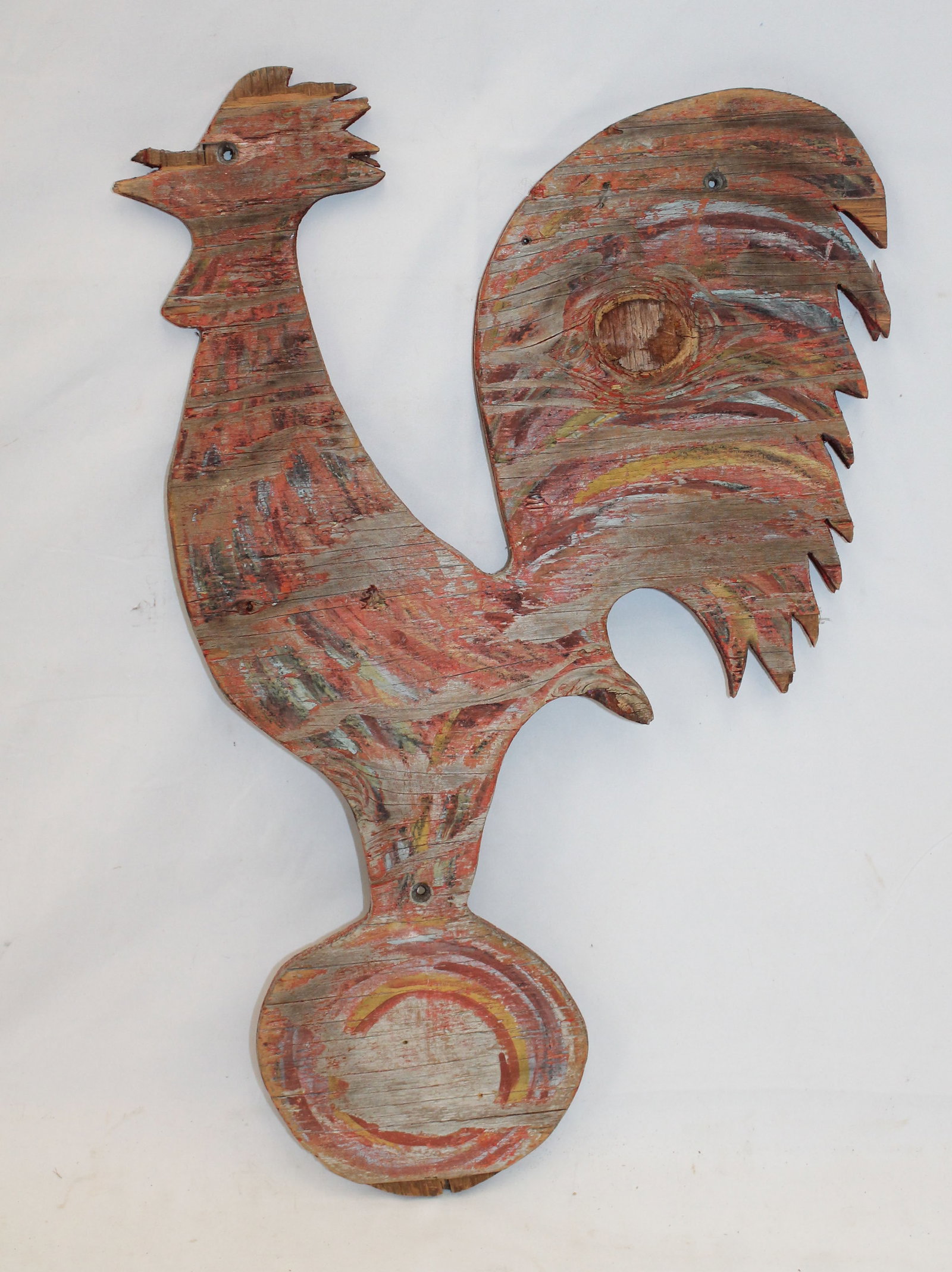 Lot of 2 carved wooden painted roosters incl one on arrow in white 25" tall x 36" & the other in red: Lot of 2 carved wooden painted roosters incl one on arrow in white 25" tall x 36" & the other in red w paint decoration 23" tall x 14 1/2"