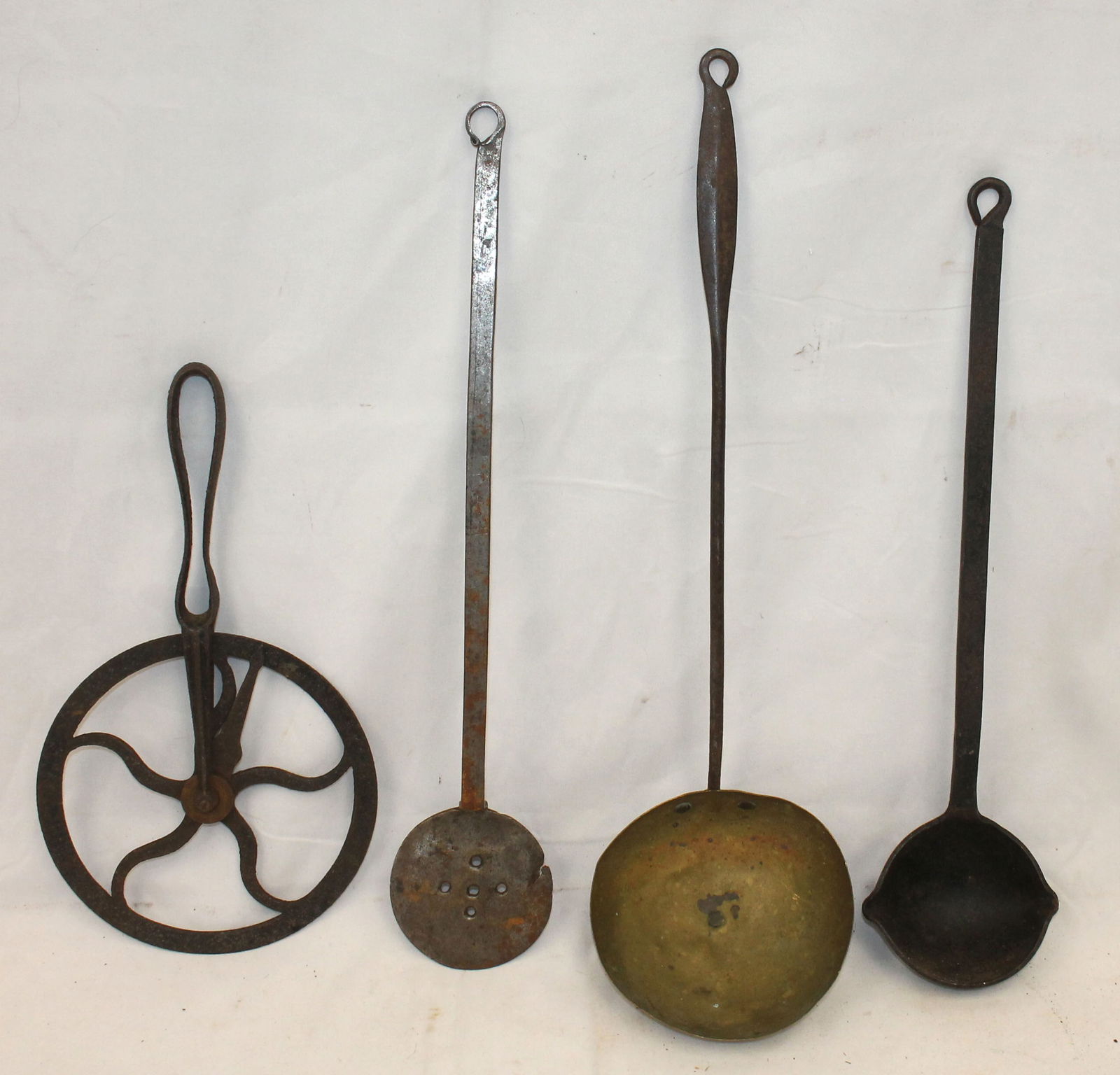Antique utensil lot incl copper ladle, iron ladle, iron spatula, & iron wagon wheel measuring tool (1 of 5)