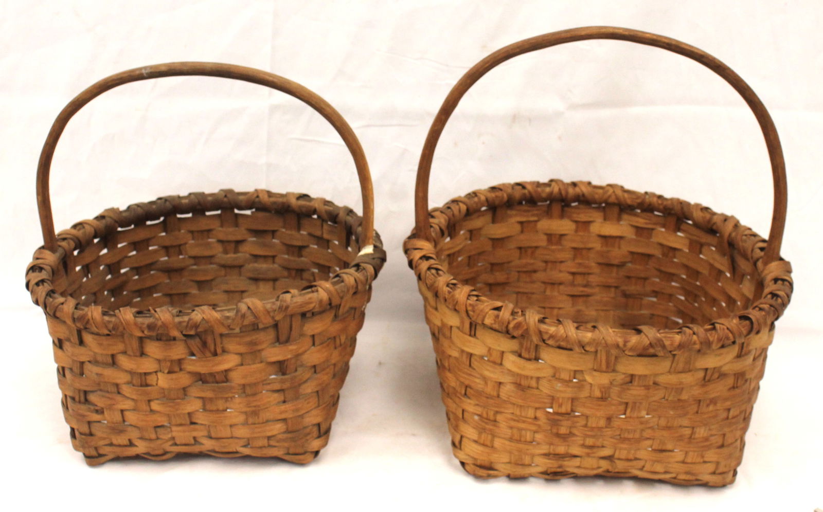 Lot of 2 fixed handled gathering baskets - 15 1/2" tall x 14" diam & 13 1/2" x 12" diam (1 of 7)