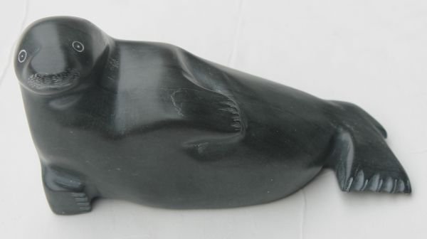 Yupik (South West Alaska) soapstone seal carving by: Yupik (South West Alaska) soapstone seal carving by an artist named Alice - 7 1/4" long