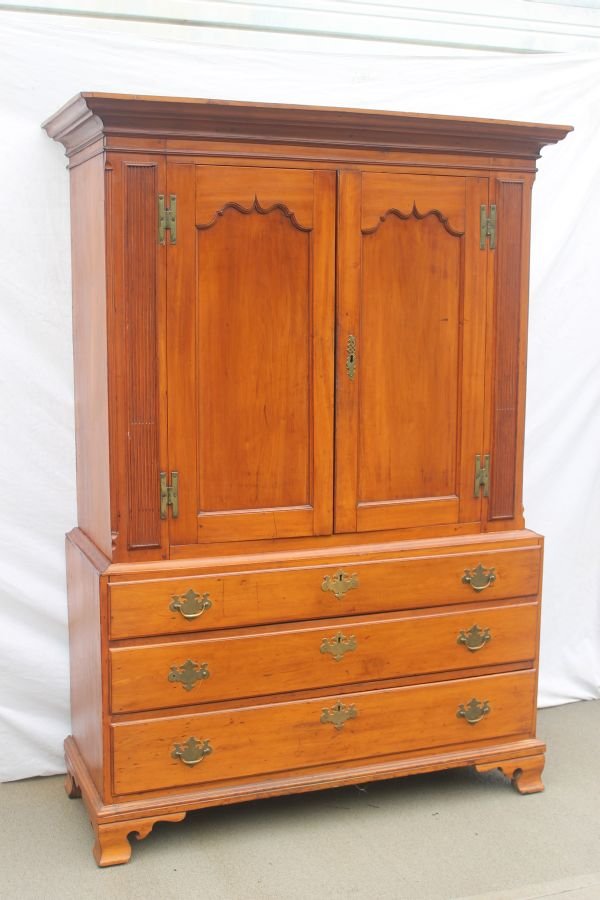 Period Chippendale 18thC rare gumwood linen press : Period Chippendale 18thC rare gumwood linen press on ogee bracket base w unusual stop fluting & lamb's tongue carving featuring tombstone doors - formerly in the Dupont family - 72" tall x 48" wide