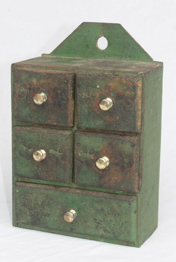19thC diminutive wall hanging 5 drawer spice or ap: 19thC diminutive wall hanging 5 drawer spice or apothecary cabinet w carved floral dec on drawers in old green paint - 9 1/2" tall