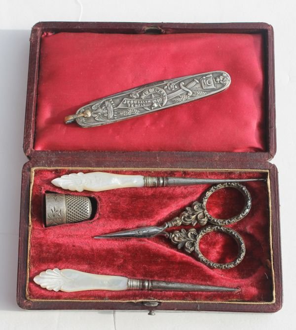 orig boxed antique sewing set w sterling silver ha: orig boxed antique sewing set w sterling silver handled scissors, sterling thimble, sterling & MOP tatting hooks together w a sterling silver pocket knife embossed w fraternal symbols