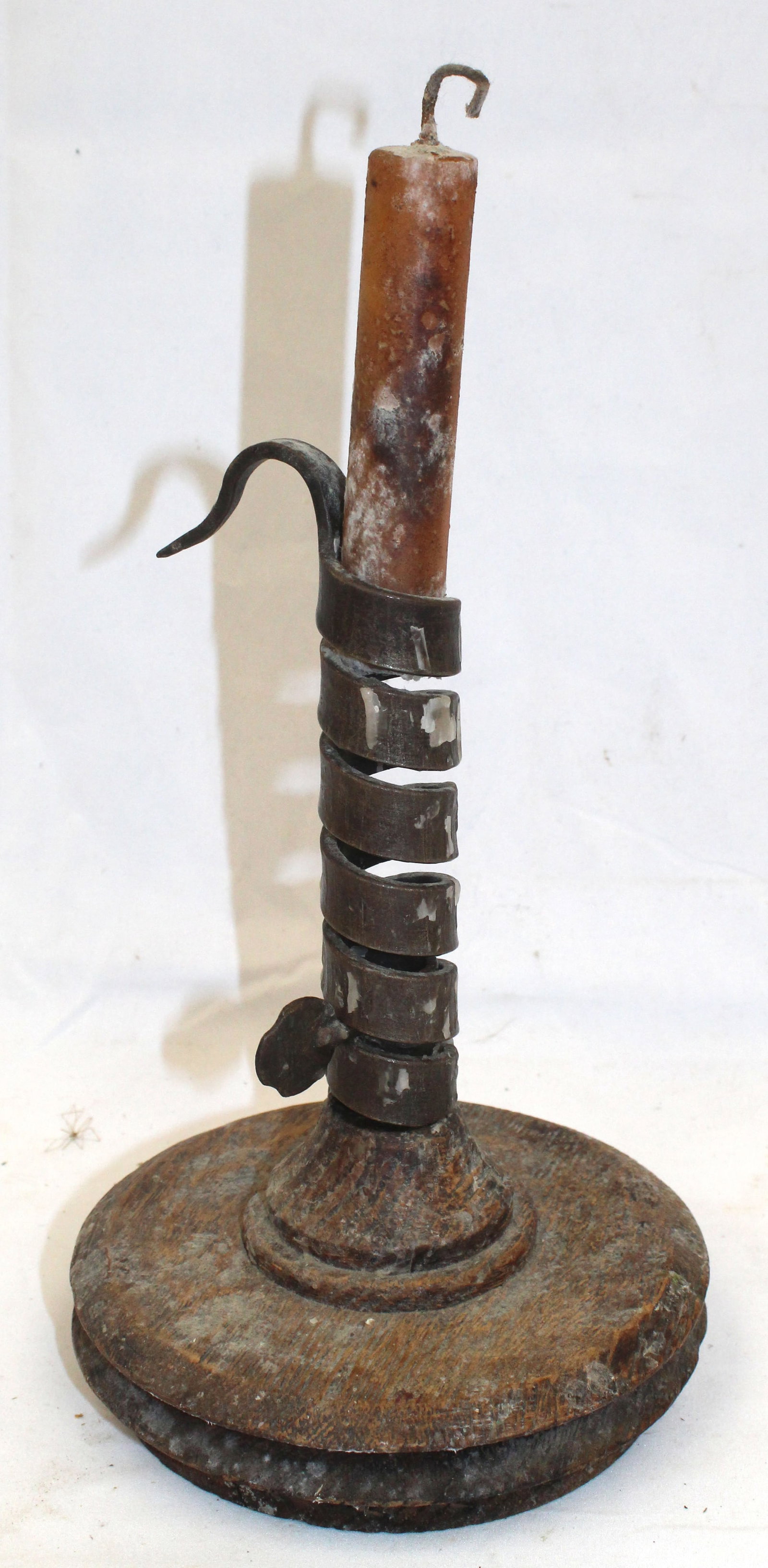 Antique iron push up spiral candle holder on make do wooden base - 8 1/2" tall: Antique iron push up spiral candle holder on make do wooden base - 8 1/2" tall