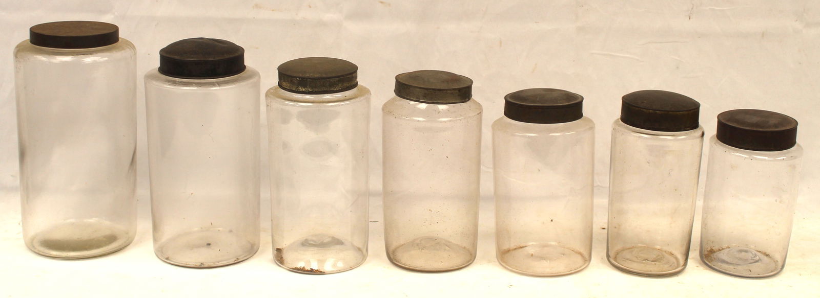 Lot of 7 glass apothecary jars w tin lids - 8"-11 1/2" tall (1 of 9)