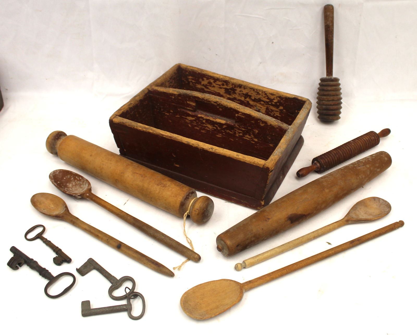 Antique large utility tote in red paint filled with implements - rolling pins, spoons, etc - tote (1 of 8)