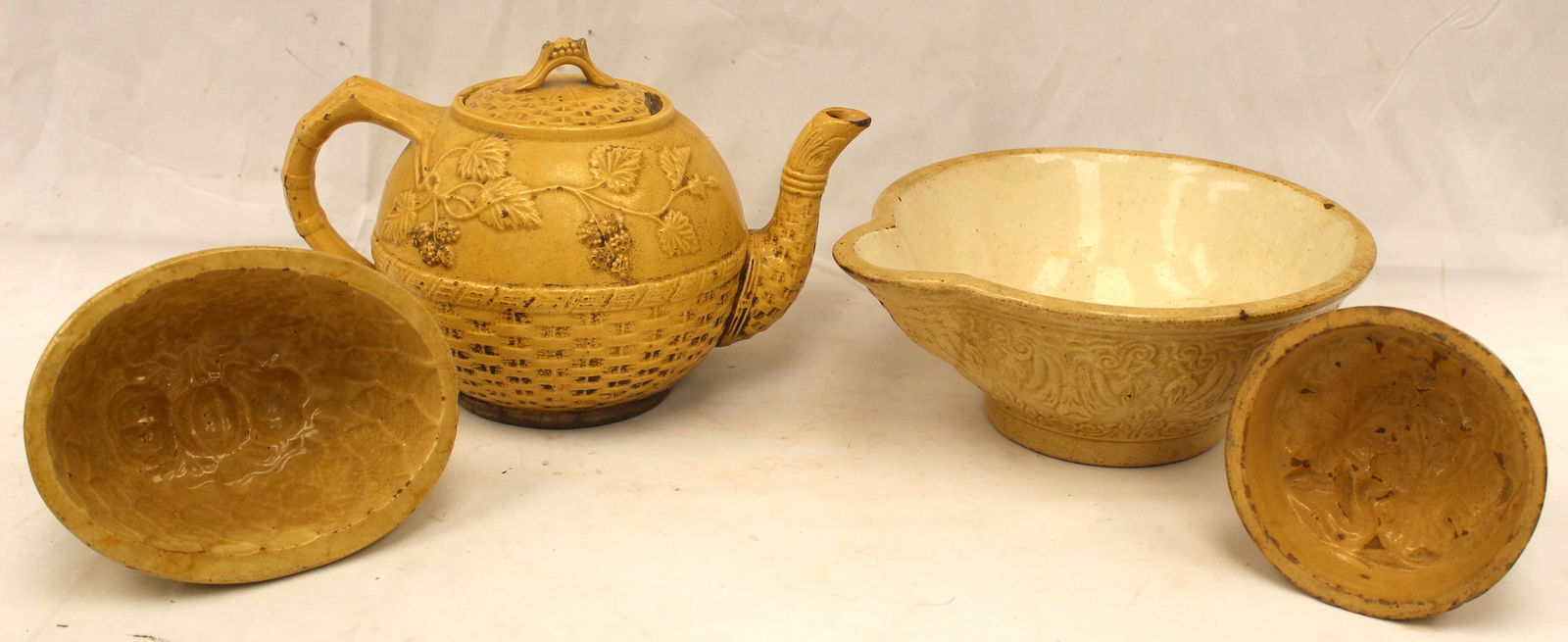 Lot of 4 antique yellowware items incl teapot, batter bowl & 2 molds - 5" & 7" molds, 10" batter jug (1 of 9)