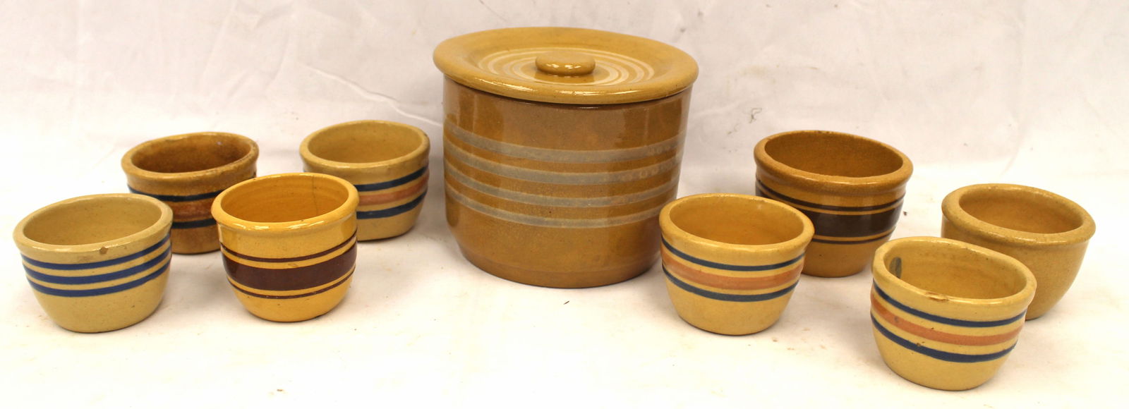 Lot of 9 antique yellowware items incl 8 custards w brown blue & pink bands plus a white banded (1 of 5)