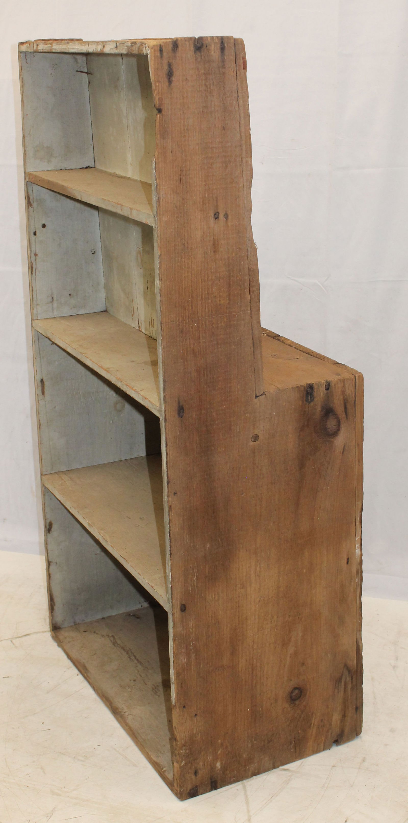 Interesting built in shelf that was built in to the back side of stairs or chimney in oyster white (1 of 6)