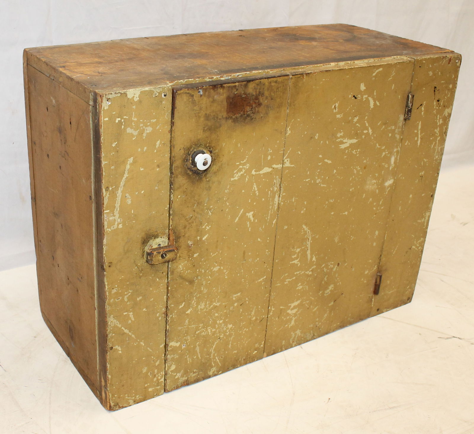 Antique 1 door hanging wall cupboard in mustard paint - 22 1/4" tall x 30" wide x 13 1/2" deep (1 of 3)