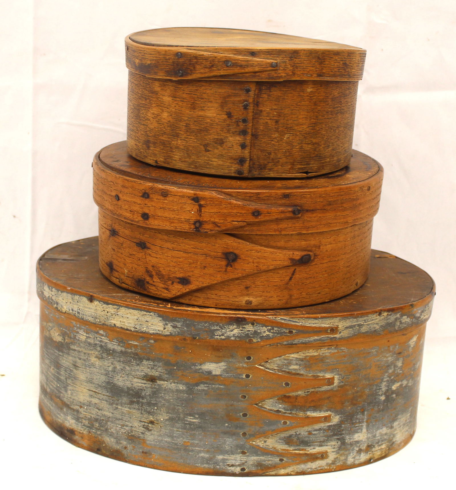 Stack of 3 antique wooden pantry boxes incl an oval 4 finger lapped Shaker in traces of blue/gray (1 of 7)