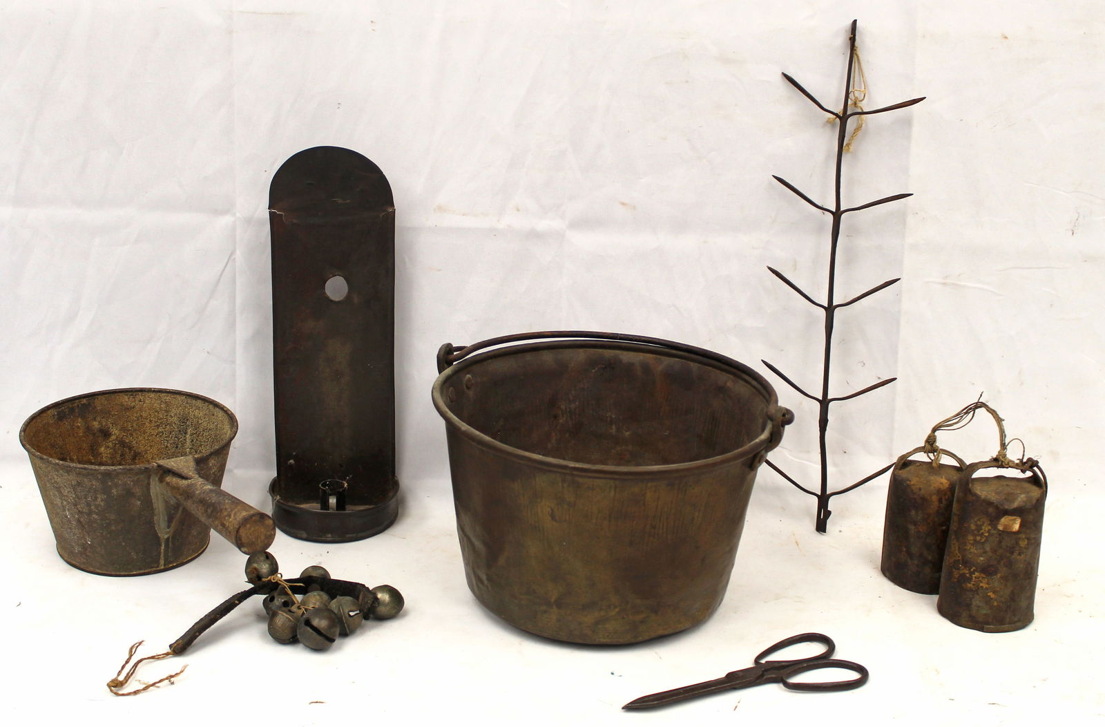 Antique brass bucket w misc implements inside incl bells, sconce, corn dryer, scissors & pot - (1 of 9)