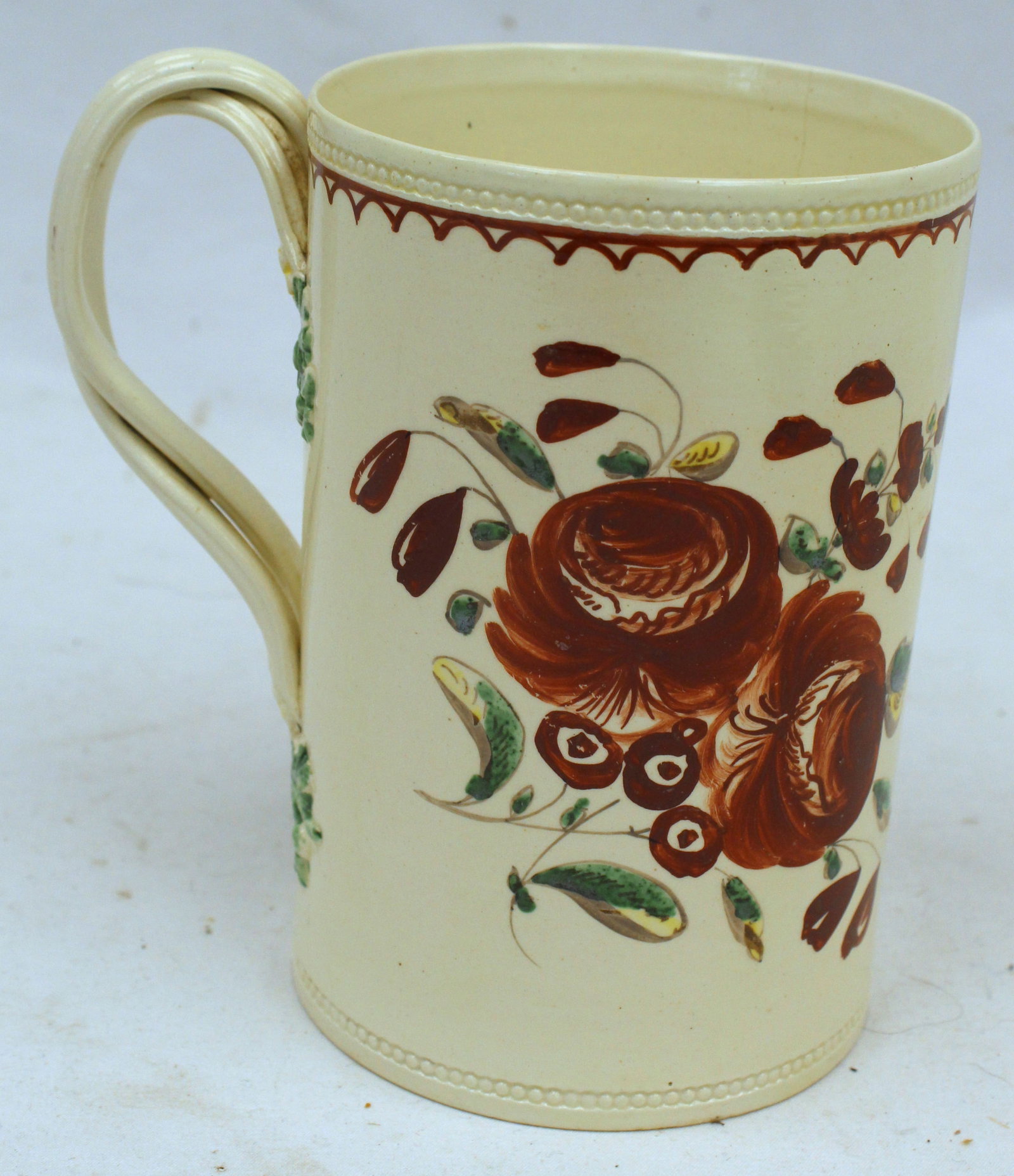 ca 1760 English Creamware mug w hand painted roses decoration & a strap handle w flower & leaf: ca 1760 English Creamware mug w hand painted roses decoration & a strap handle w flower & leaf terminations