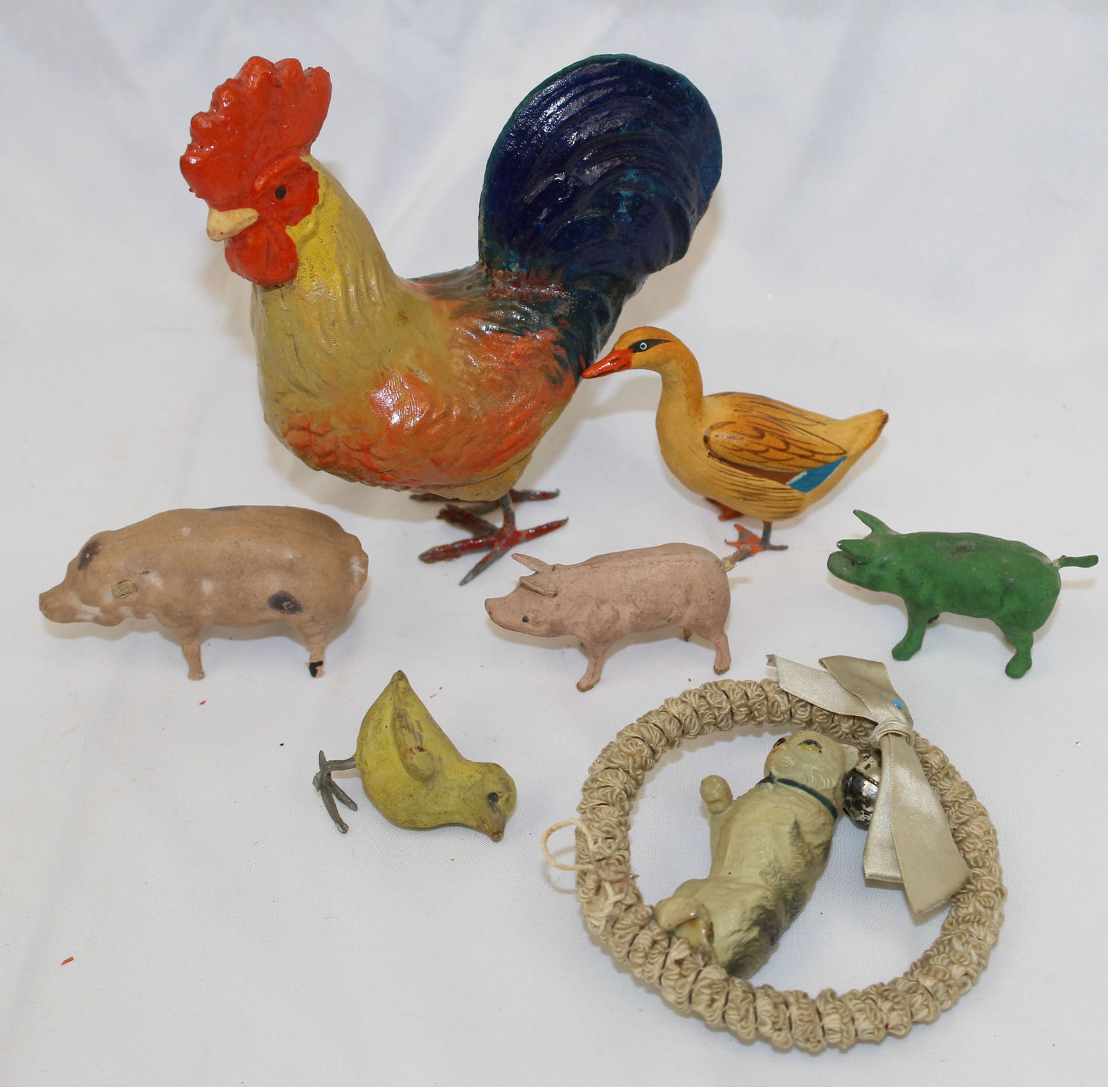 Lot of 7 celluloid & metal animals incl rooster, ducks, pigs & cat (1 of 8)