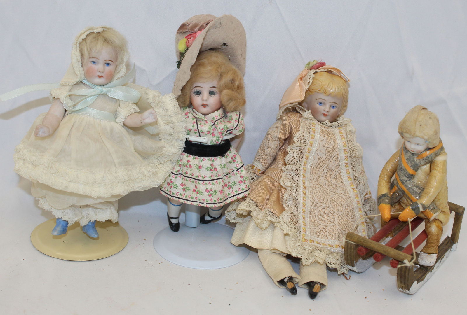 lot of 5 small porcelain & bisque head dolls (1 of 5)