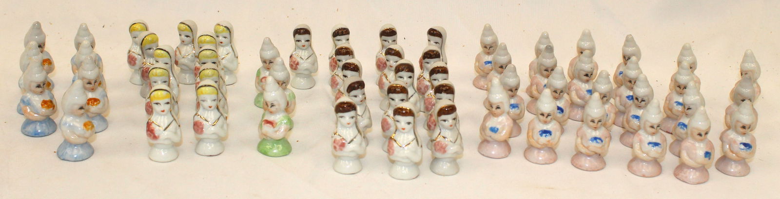 Large lot of Japanese figural porcelain pin cushion toppers (1 of 6)