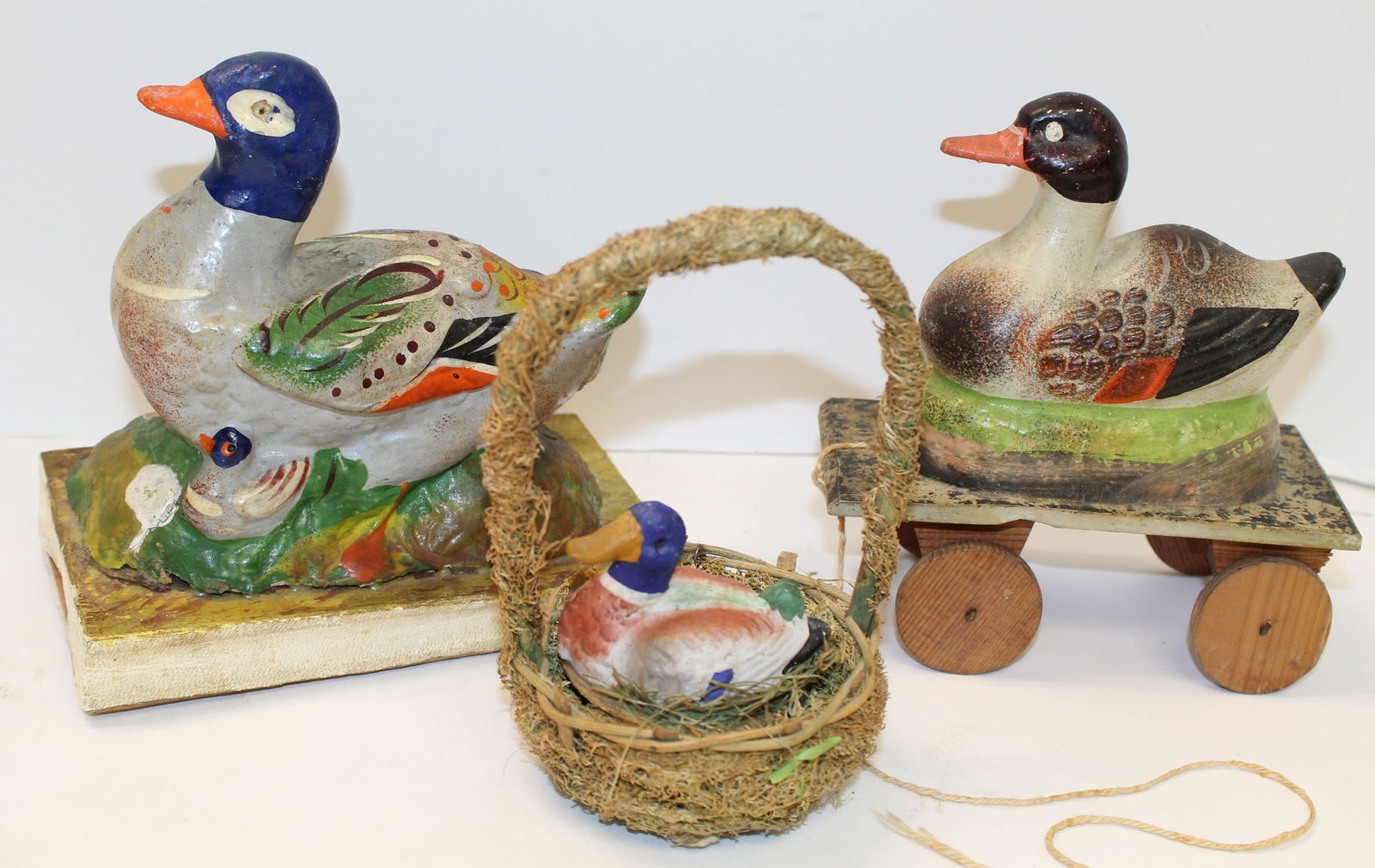 Lot of 3 mallard duck related items incl pull toy, squeak toy & duck in basket (1 of 10)