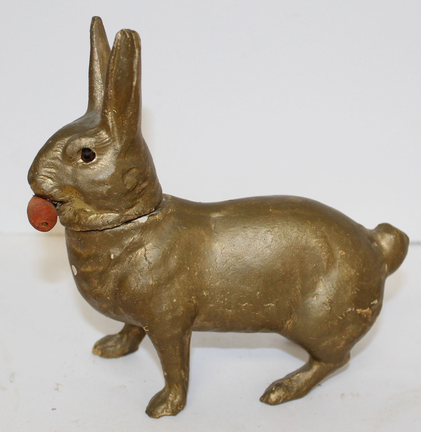Vintage German Easter rabbit candy container in gold paint w carrot in mouth & glass eyes - 7" x 7" (1 of 7)