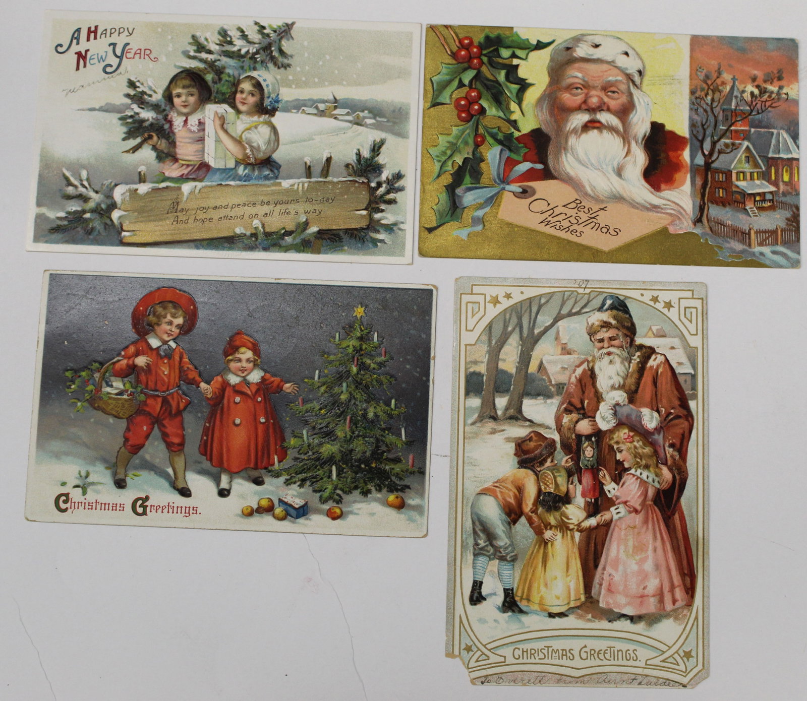 Lot of 4 antique Christmas motif postcards: Lot of 4 antique Christmas motif postcards