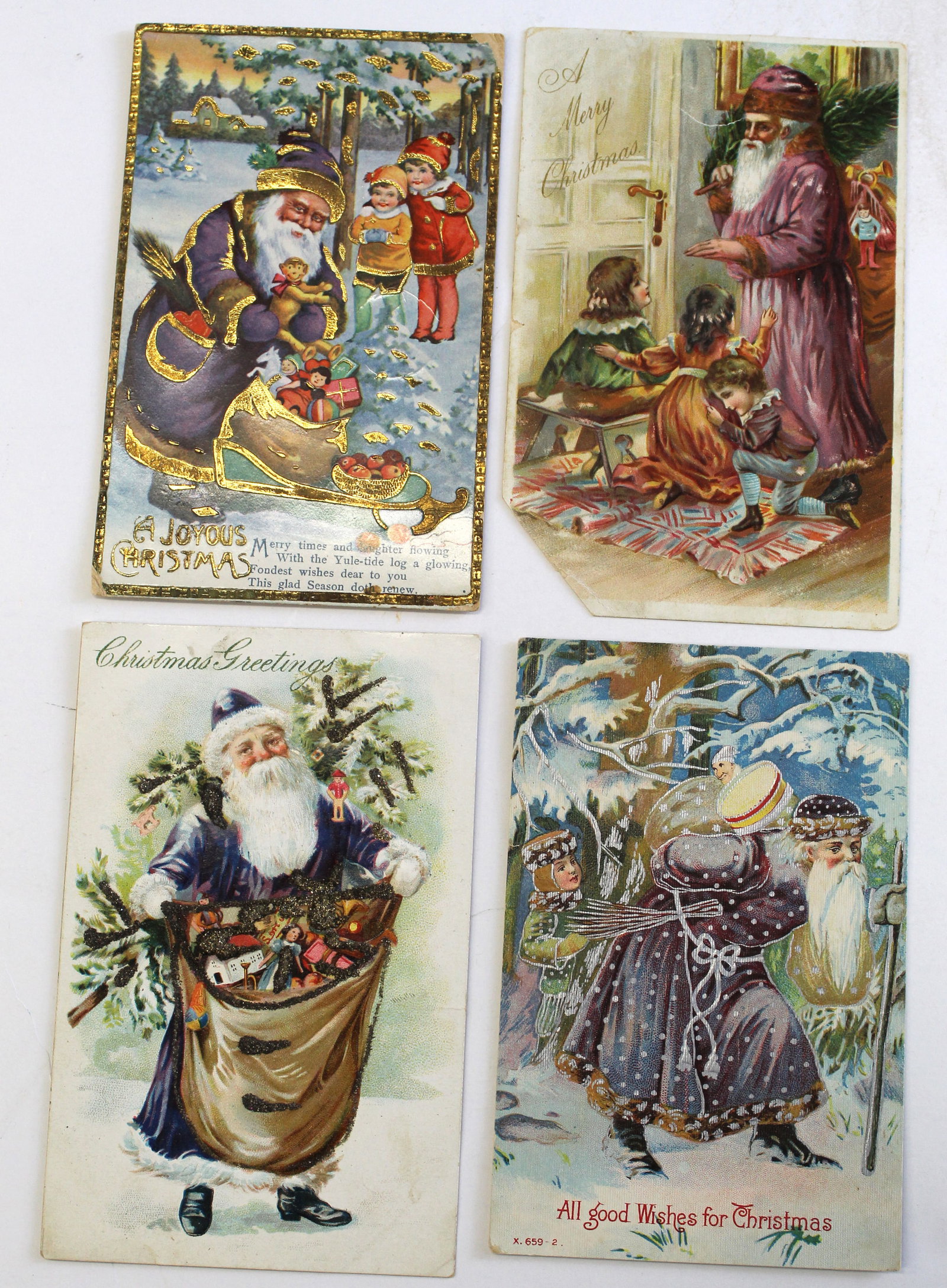 Lot of 4 antique Christmas motif postcards: Lot of 4 antique Christmas motif postcards
