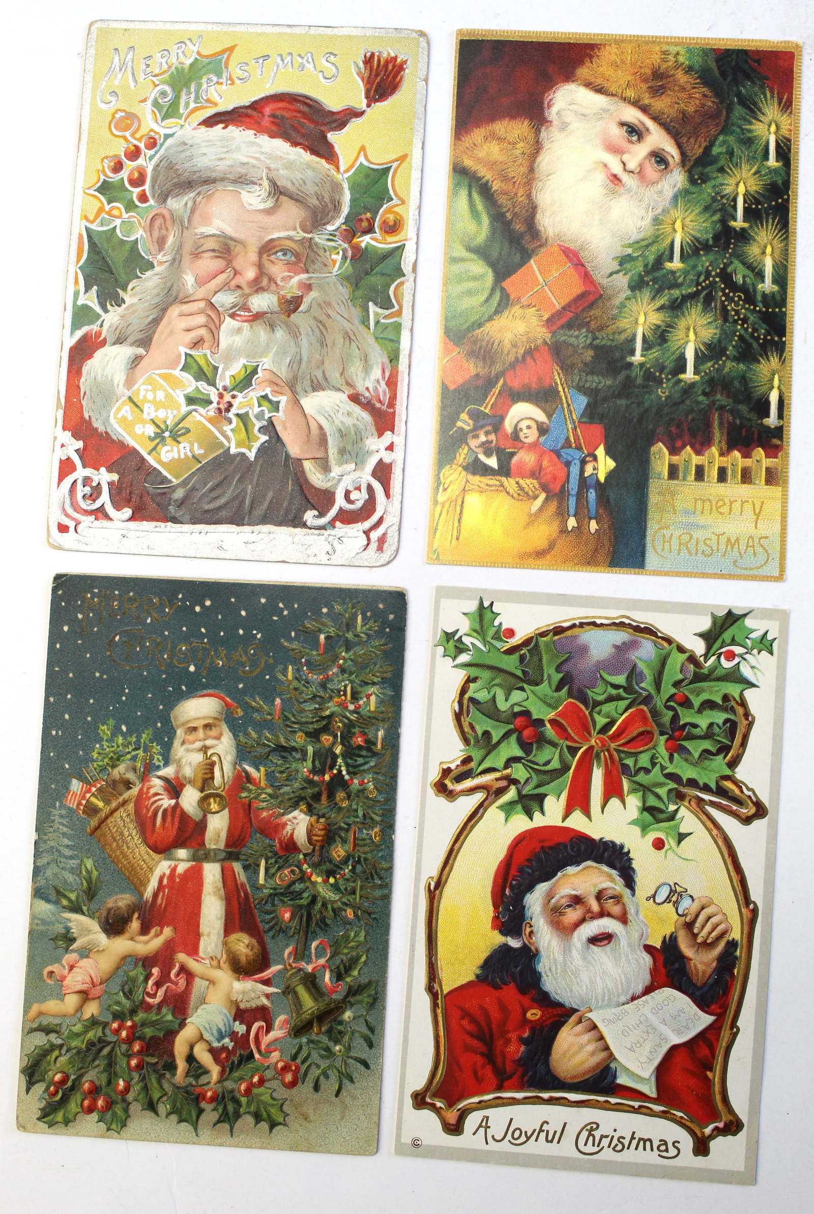 Lot of 4 antique Christmas motif postcards: Lot of 4 antique Christmas motif postcards