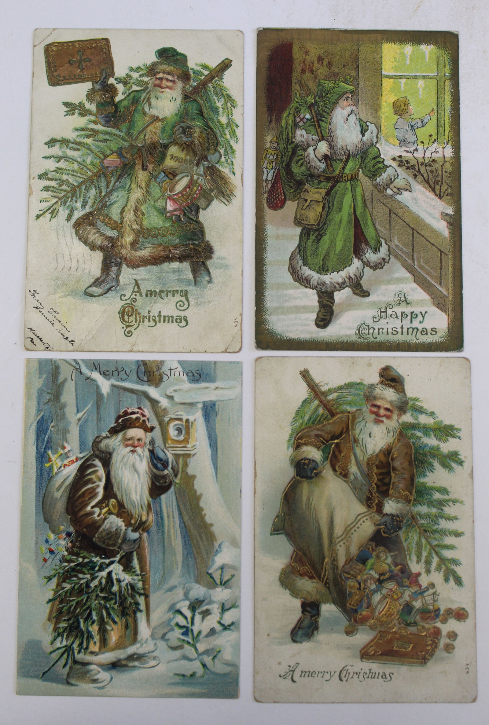 Lot of 4 antique Christmas motif postcards: Lot of 4 antique Christmas motif postcards