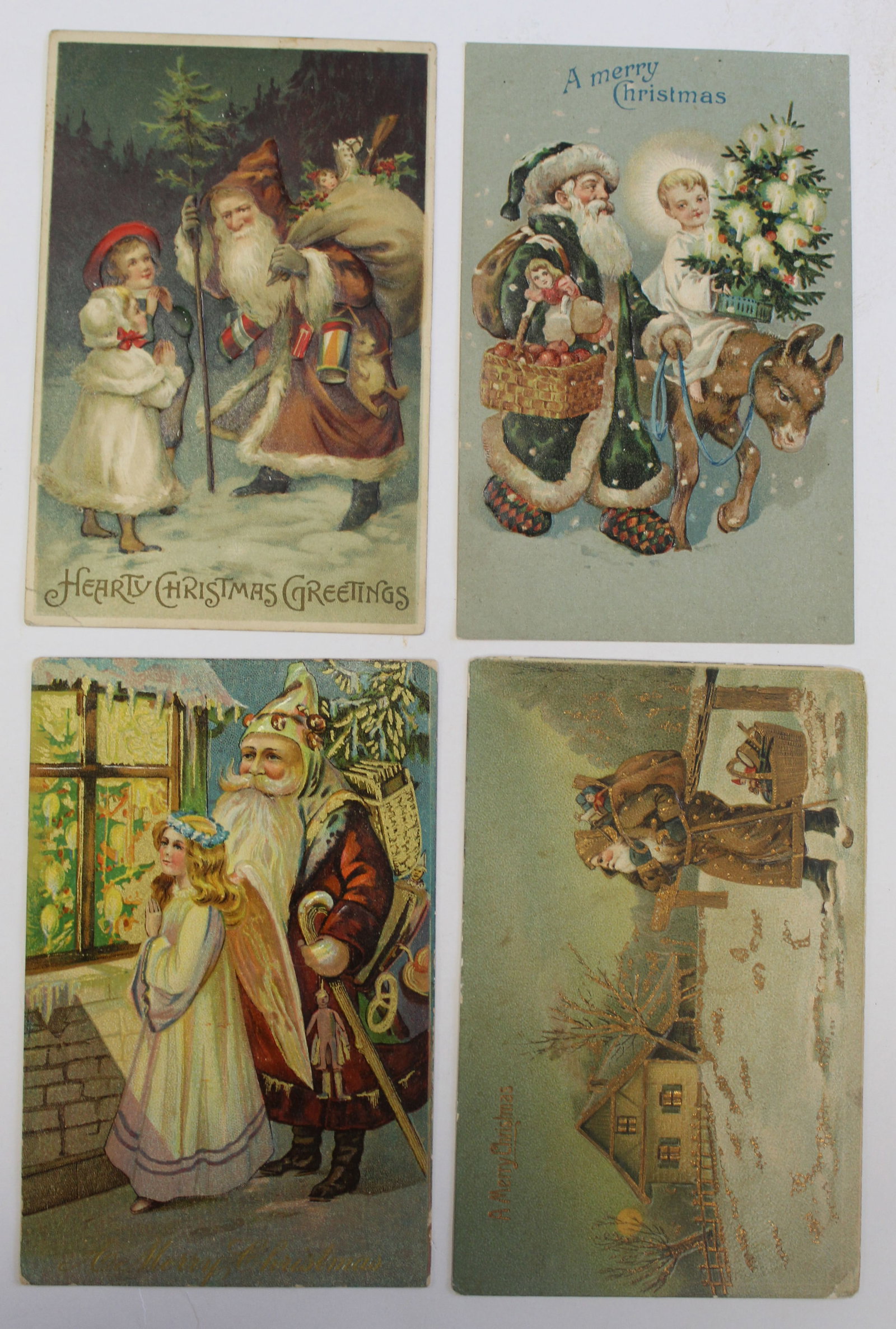 Lot of 4 antique Christmas motif postcards: Lot of 4 antique Christmas motif postcards