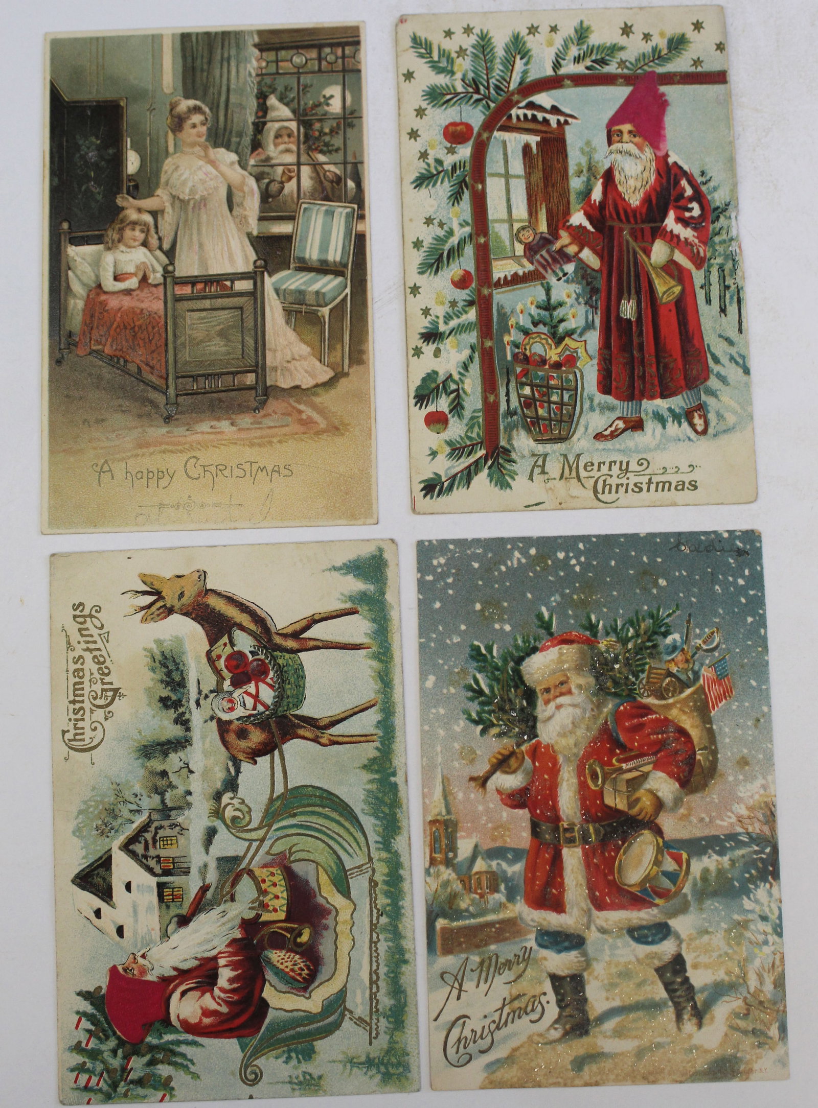Lot of 4 antique Christmas motif postcards: Lot of 4 antique Christmas motif postcards