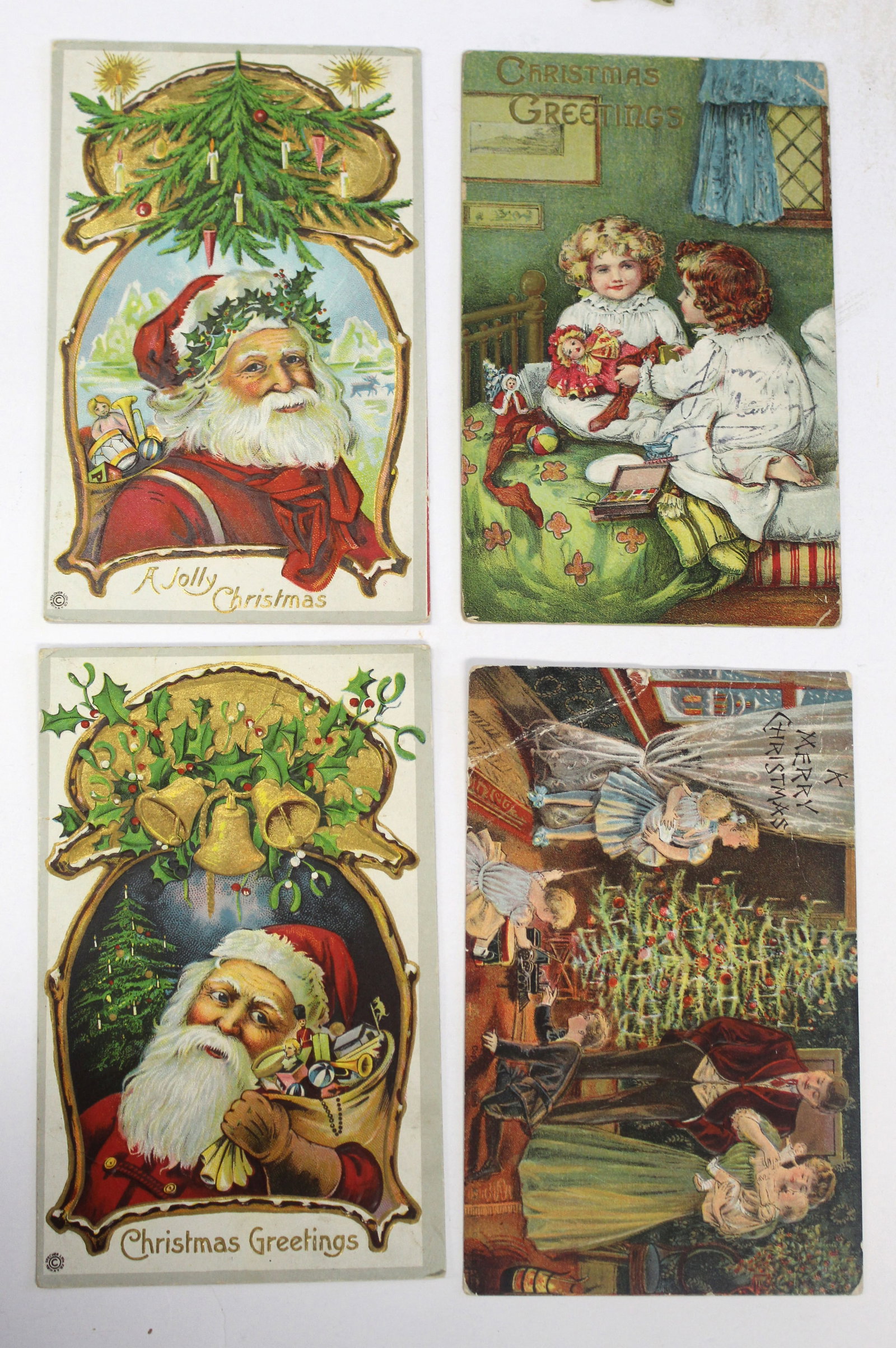 Lot of 4 antique Christmas motif postcards: Lot of 4 antique Christmas motif postcards