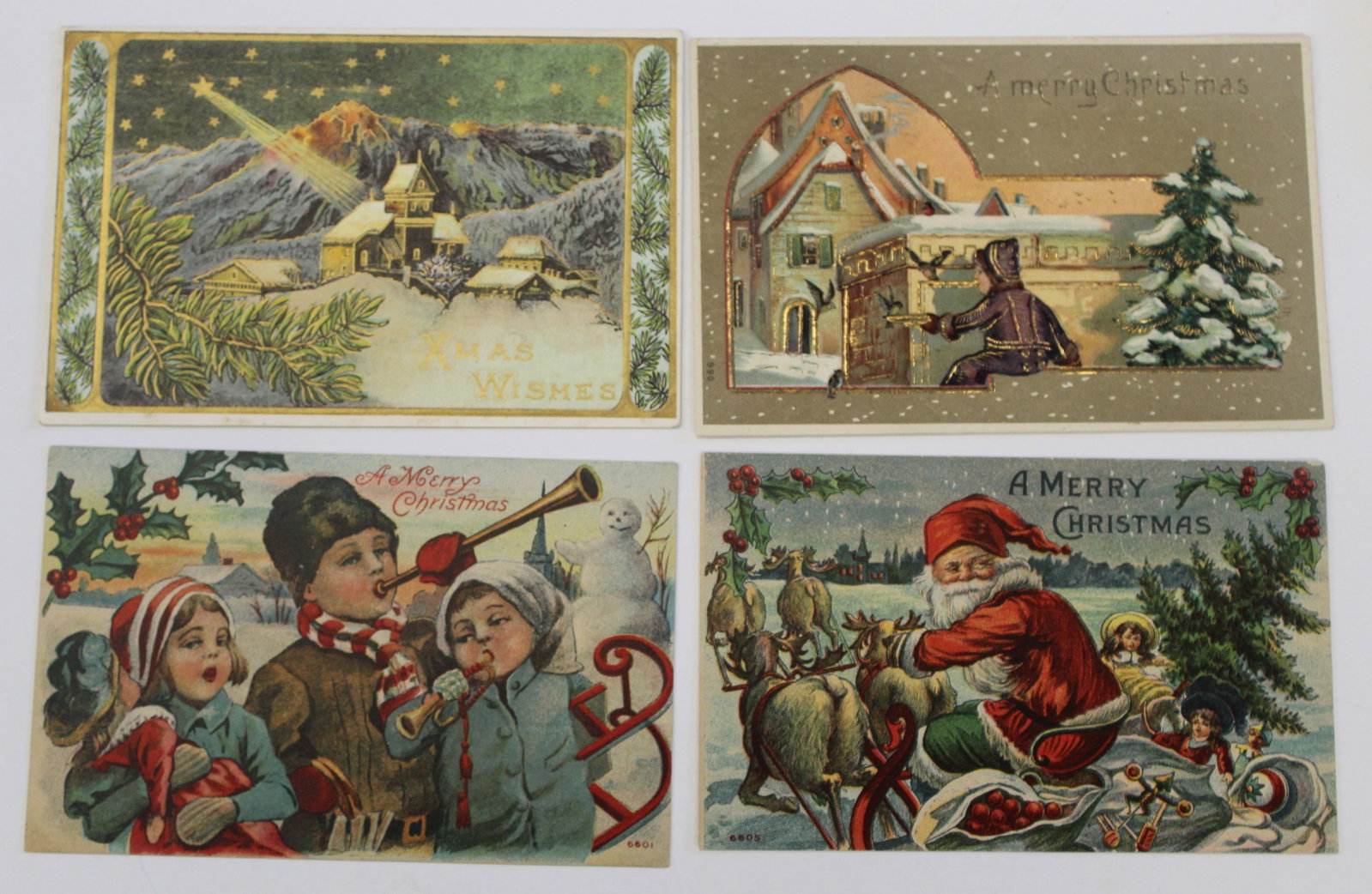 Lot of 4 antique Christmas motif postcards - unwritten & not posted: Lot of 4 antique Christmas motif postcards - unwritten & not posted