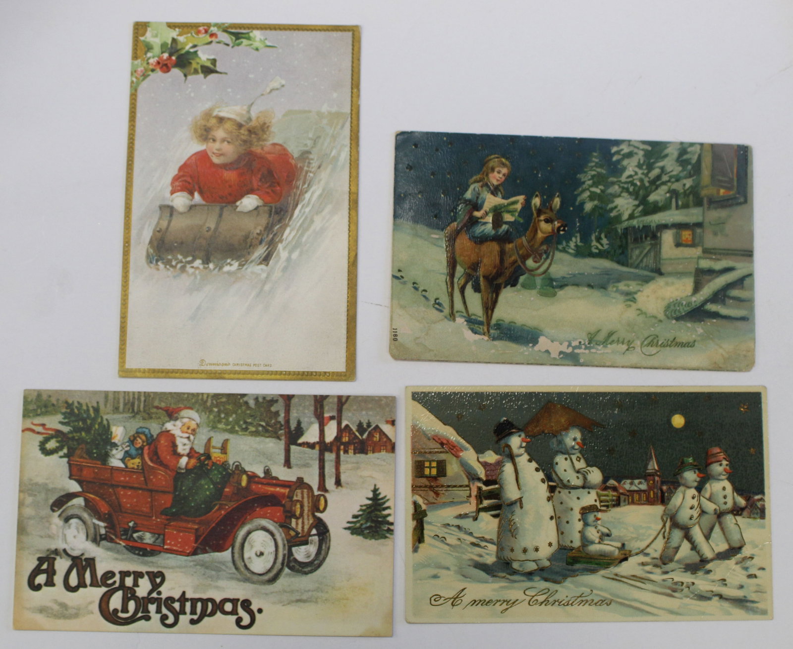 Lot of 4 antique Christmas motif postcards - unwritten & not posted: Lot of 4 antique Christmas motif postcards - unwritten & not posted