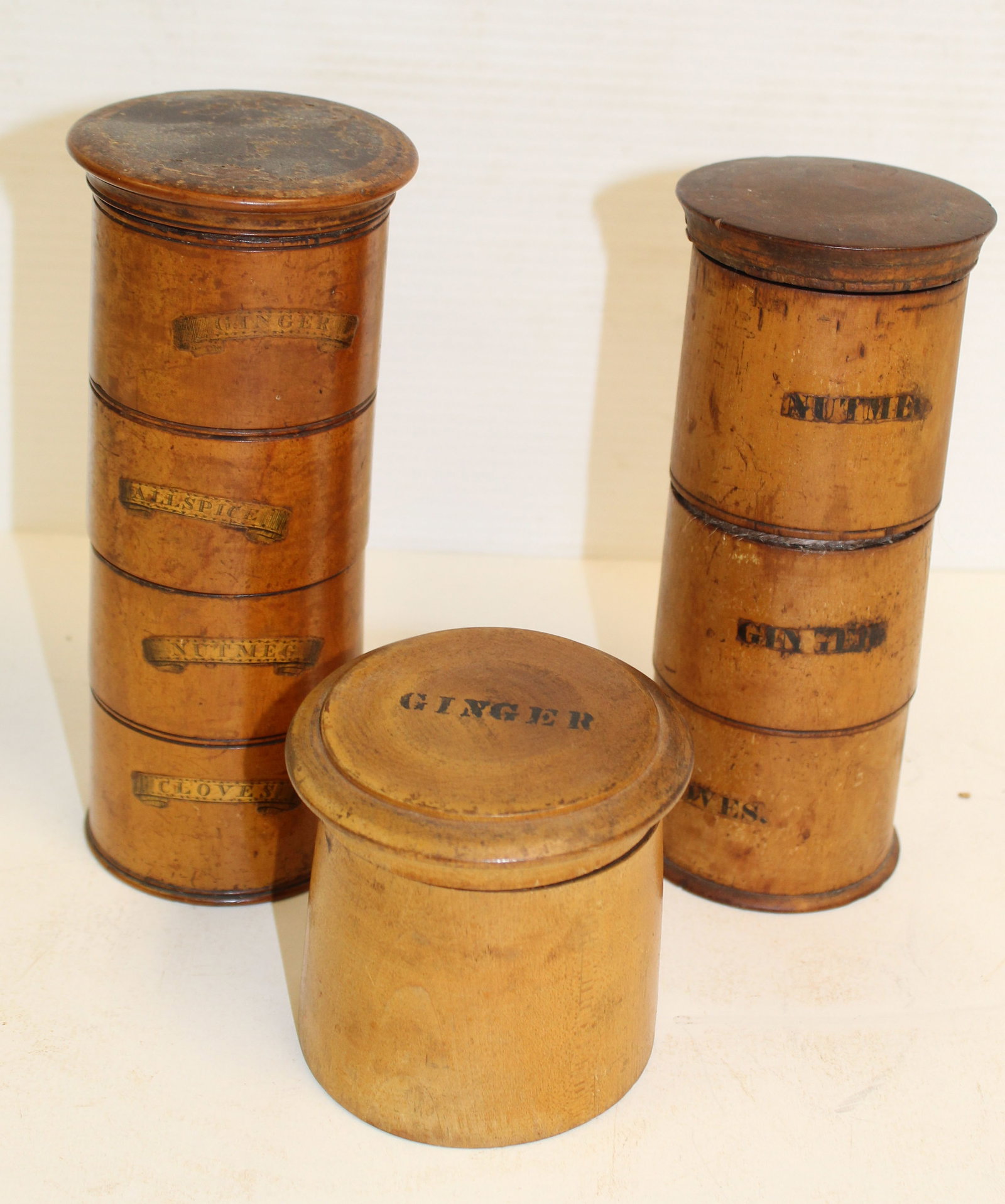 Lot of 3 antique wooden cylinder spice cannisters w labels - single 3 1/4", 3 sections 6 3/4" & 4: Lot of 3 antique wooden cylinder spice cannisters w labels - single 3 1/4", 3 sections 6 3/4" & 4 sections 7"