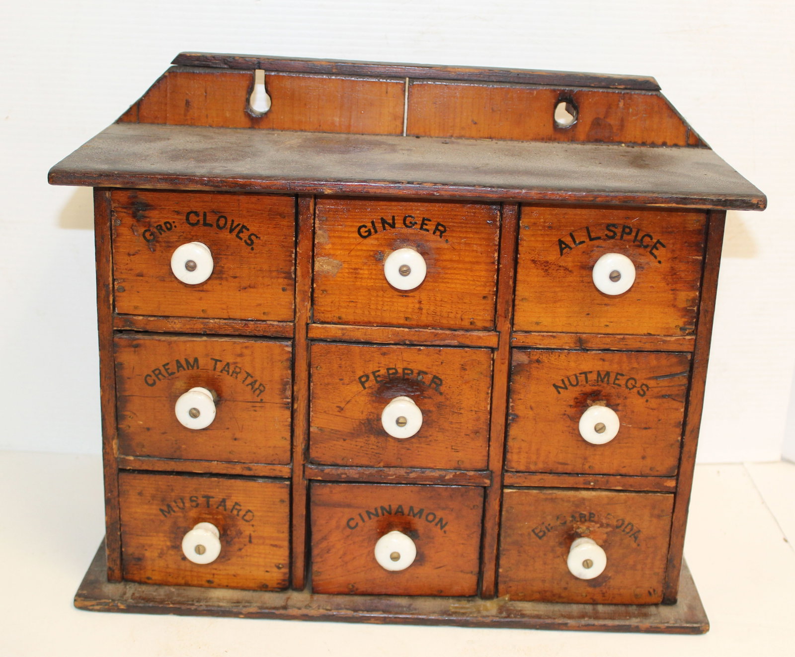 Antique 9 drawer spice chest w porcelain knobs & stenciled labels on drawers - 12 1/2" tall x 15" x: Antique 9 drawer spice chest w porcelain knobs & stenciled labels on drawers - 12 1/2" tall x 15" x 5"